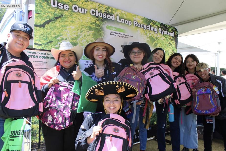 Families and volunteers at a Green Education Foundation Backpack Exchange