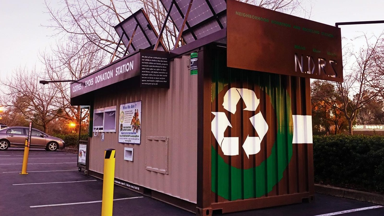 A GEF Neighborhood Donation Recycling Station at dusk